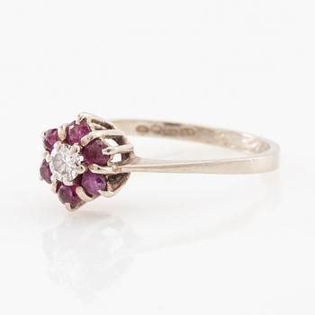 Ring 14K white gold set with a round brilliant-cut diamond and faceted rubies, Finland 1975.
