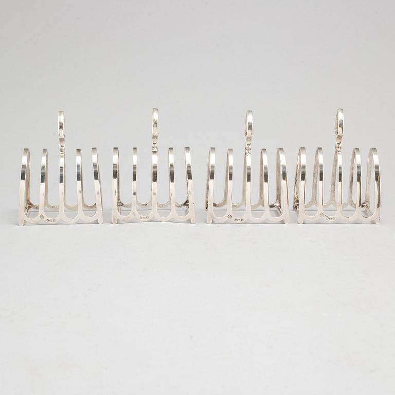 a set of four silver toastracks, Barker Brothers Birmingham 1936.