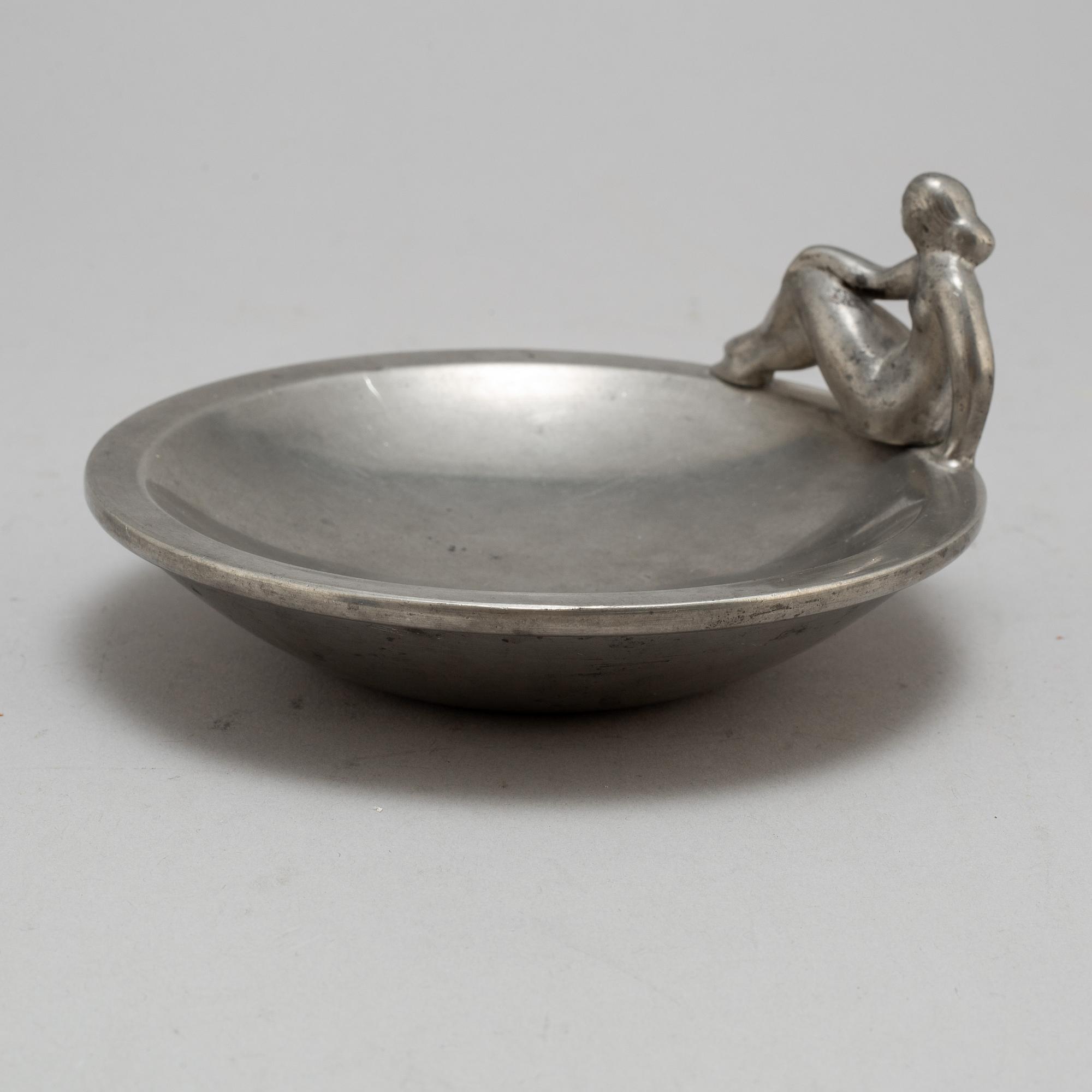 a pewter plate by Firma Svenskt Tenn Stockholm, 1928.