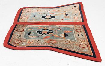 An antique Tibetia saddle blanket ca 78 x 137 cm.