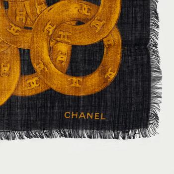 Chanel, a shawl and a silk scarf.