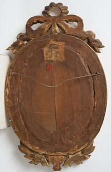 A late gustavian girandole mirror signed by Claes Eric Reding, Karlskrona, (master 1808-1815).