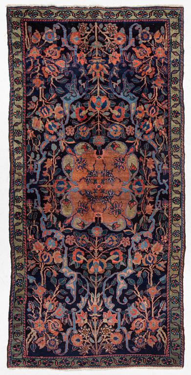 An antique Hamadan, c. 315 x 155 cm.