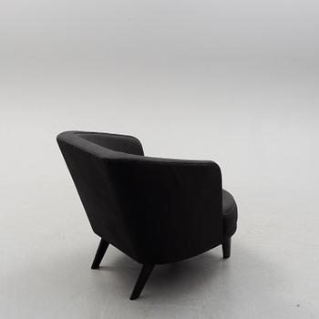 A Jonny Johansson upholstered sofa, Acne Studios, O.H. Sjögren, Tranås, Sweden 2010.