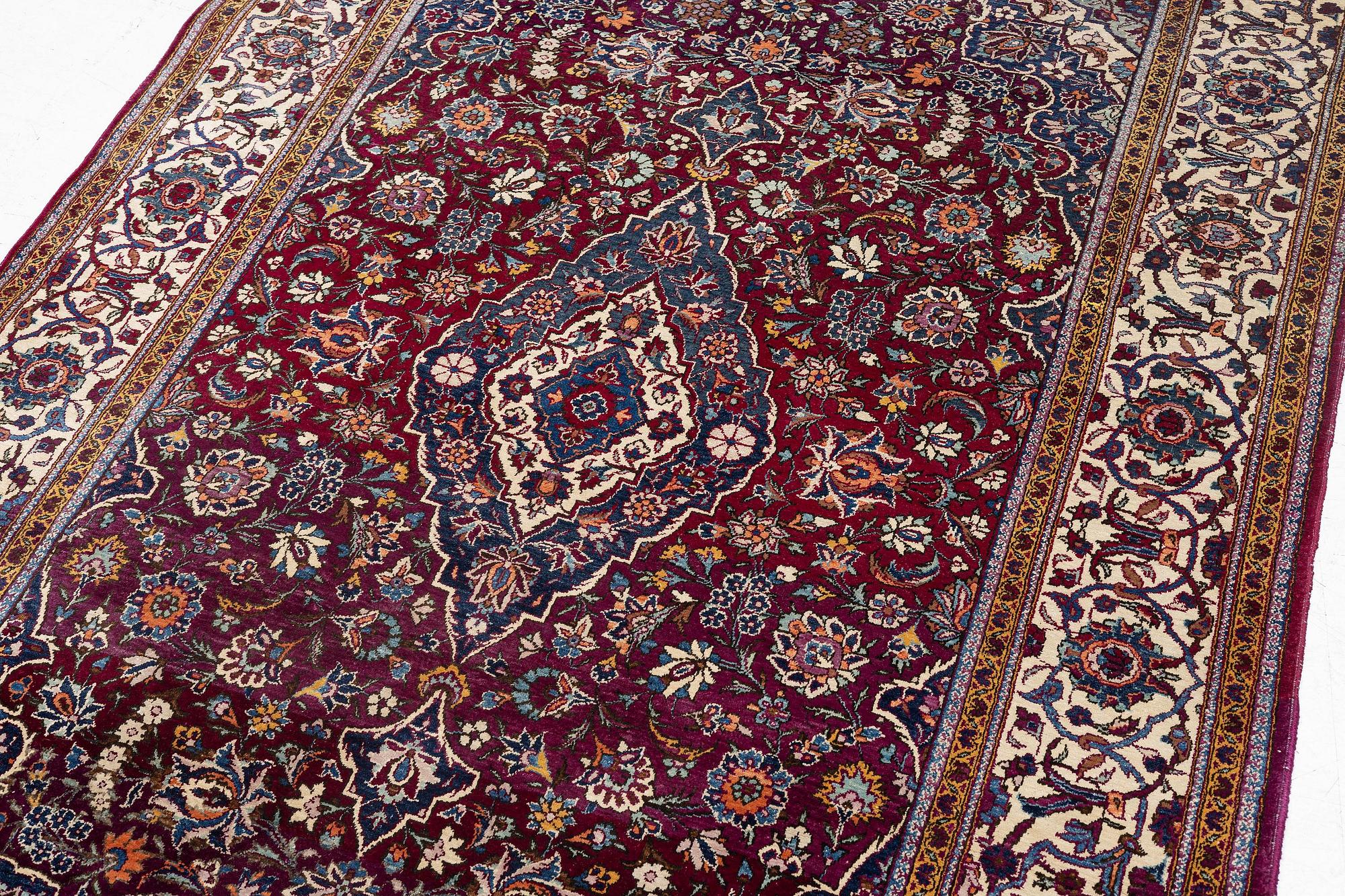 A semi-antique silk Keshan, 208 x 138 cm.