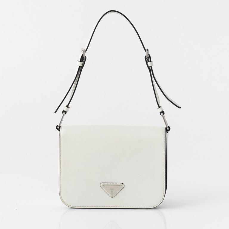 Prada, A white spazzolato leather bag.