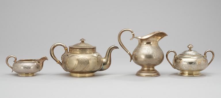 A RUSSIAN PARCEL-GILT FOUR PIECE TEA-SET, different makers, Moscow 1873-1908.