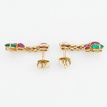 Earrings with cabochon-cut and faceted rubies, emeralds, and brilliant-cut diamonds.