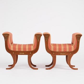 A pair of Swedish Royal Empire stools.