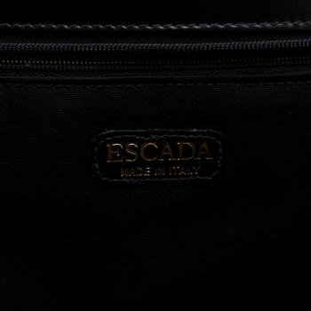 an Escada leather bag.