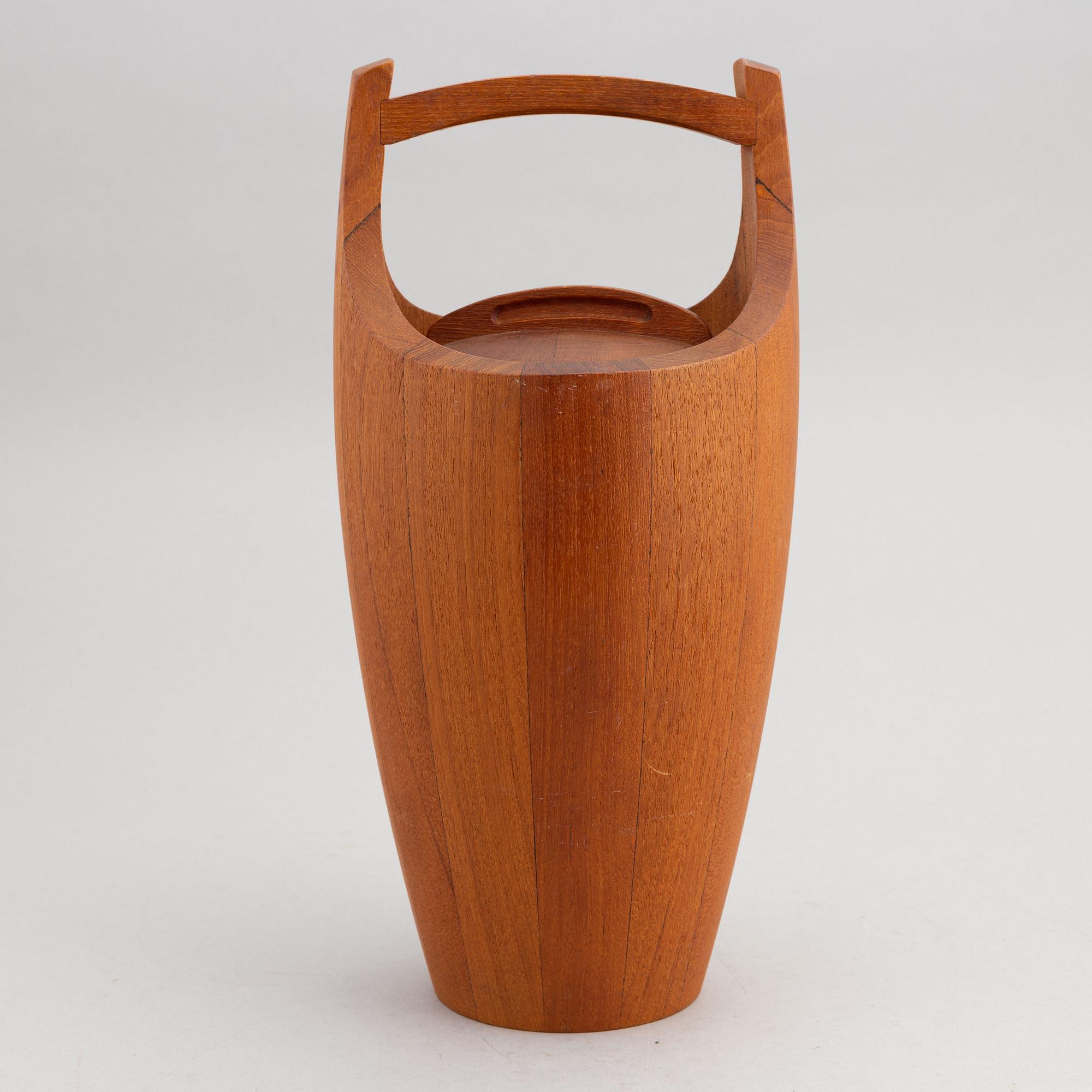 A 1950s 'Congo' teak ice bucket by Jens Quistgaard, Dansk Designs, Denmark.