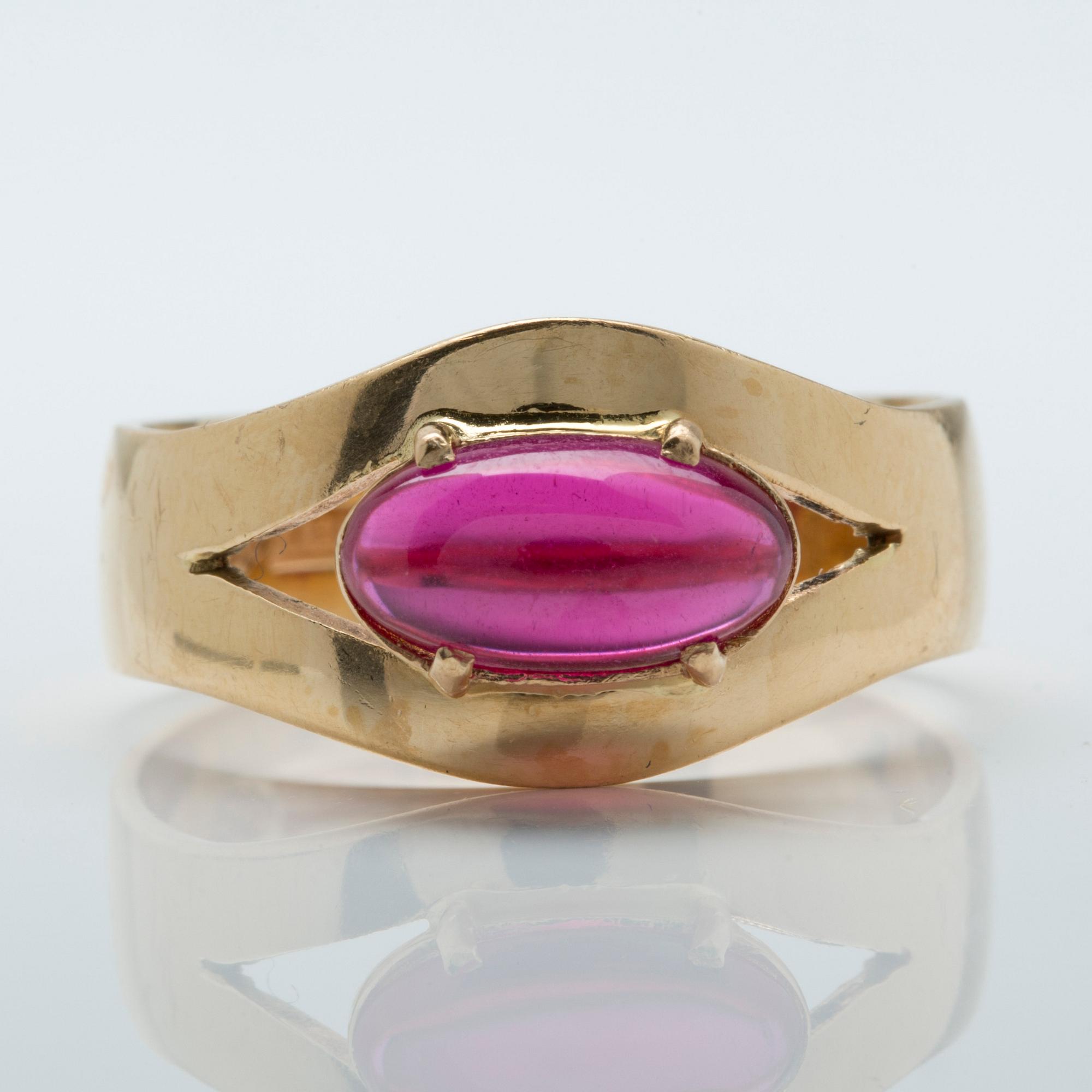 A cabochon-cut ruby ring.