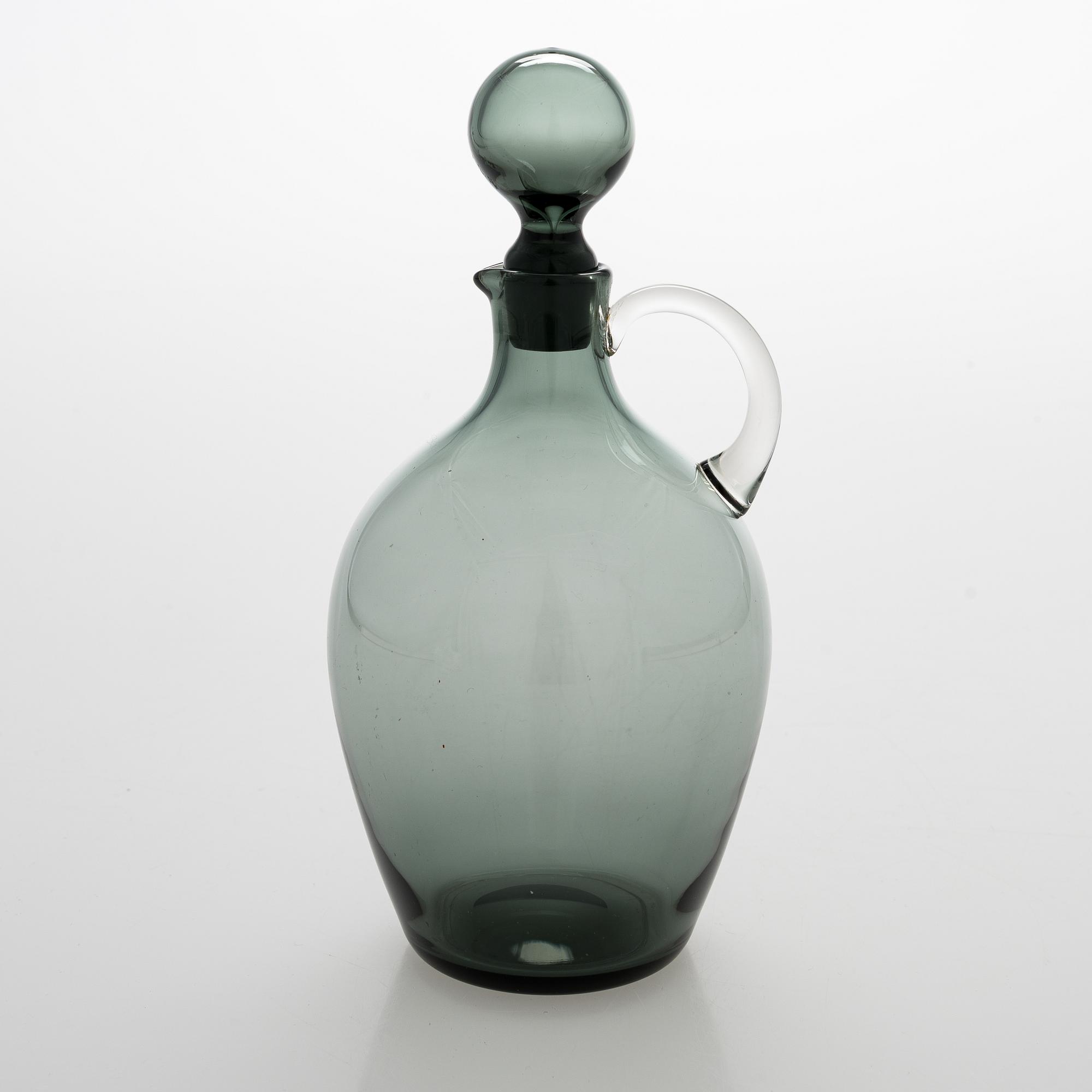Saara Hopea,  A glass carafe and six drinking glasses, Nuutajärvi, Finland. Design years 1959 and 1958.
