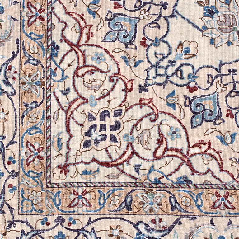 A Nain Habibian rug, part silk. Around 210 x 133 cm.