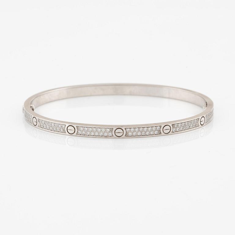 A Cartier bracelt "Love", small model, 18K white gold with round brilliant-cut diamonds.