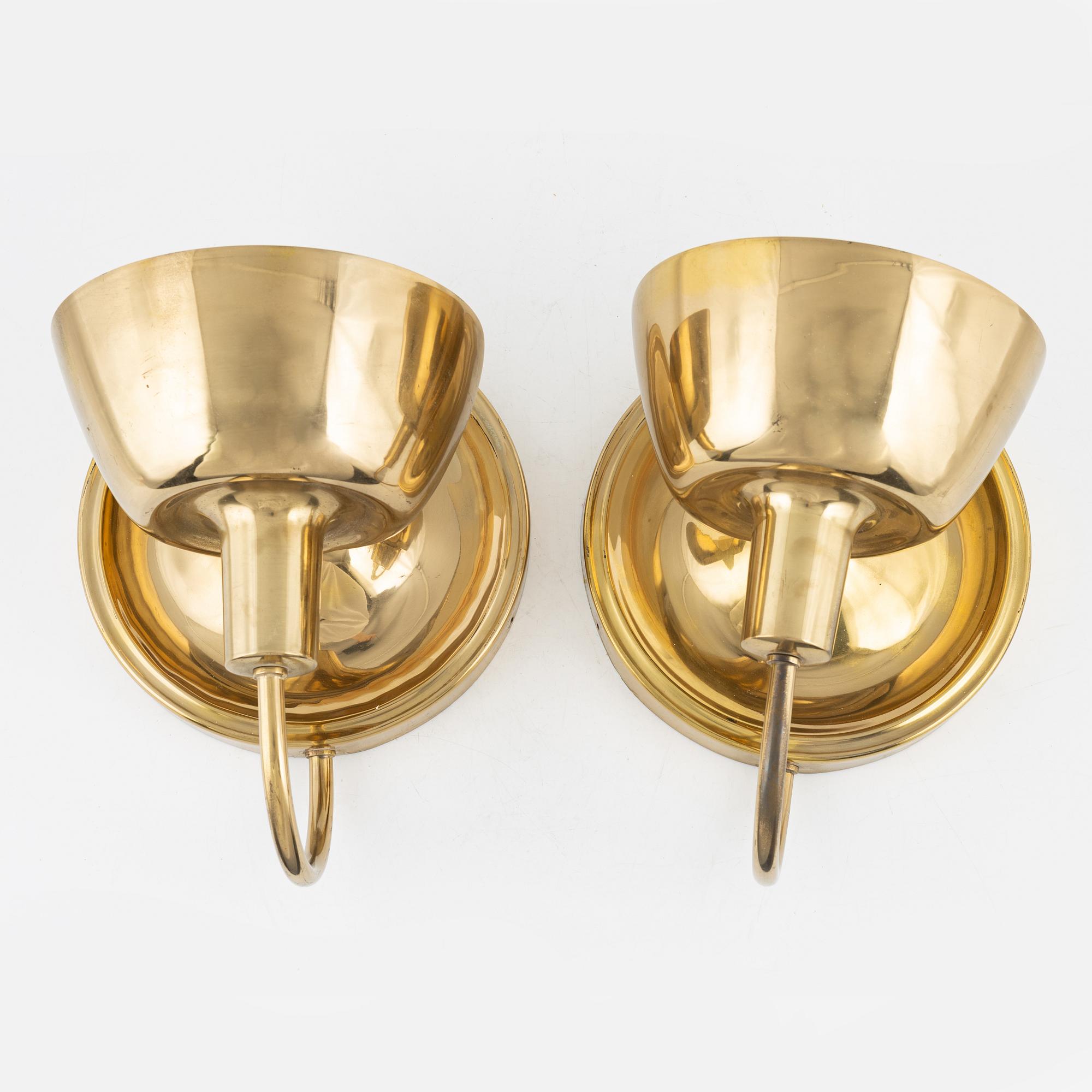 A pair of model 2389 wall lamps by Josef Frank for Firma Svenskt Tenn.
