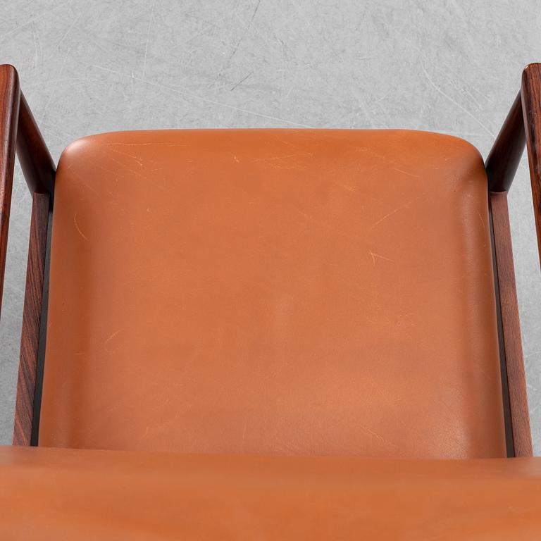 Finn Juhl, a rosewood easy chair, from Cado, Denmark, 1960's/70's.