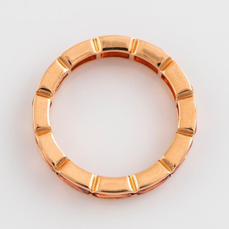 Orange sapphire ring.