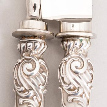 Silver serving cutlery, three with mark of Ferdinand Timper, Helsinki 1901-02 and a pair with German marks, ca. 1900.