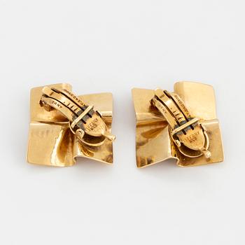 A pair of Tiffany & Co 14K gold earrings.