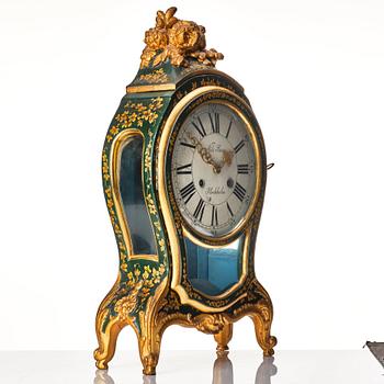 A Swedish rococo mantel clock by N Berg.