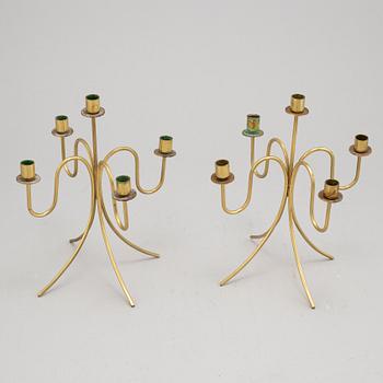 Gunnar Ander, a pair of five-light brass candelabra from Ystad Metall.