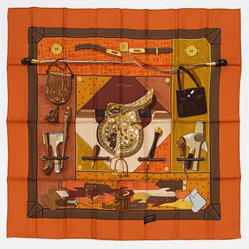 Hermès, a 'Tout cuir' silk scarf.