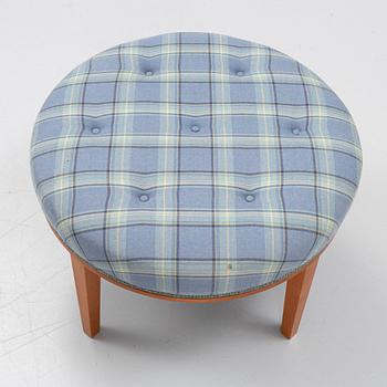 Josef Frank, a model 647 cherry wood stool by Firma Svenskt Tenn.