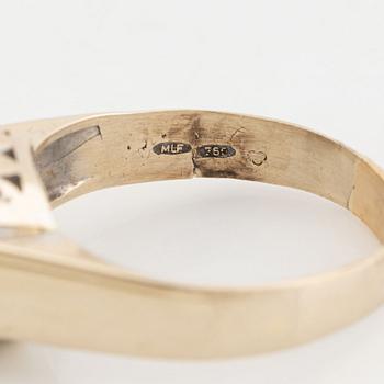 Emerald and diamond ring.