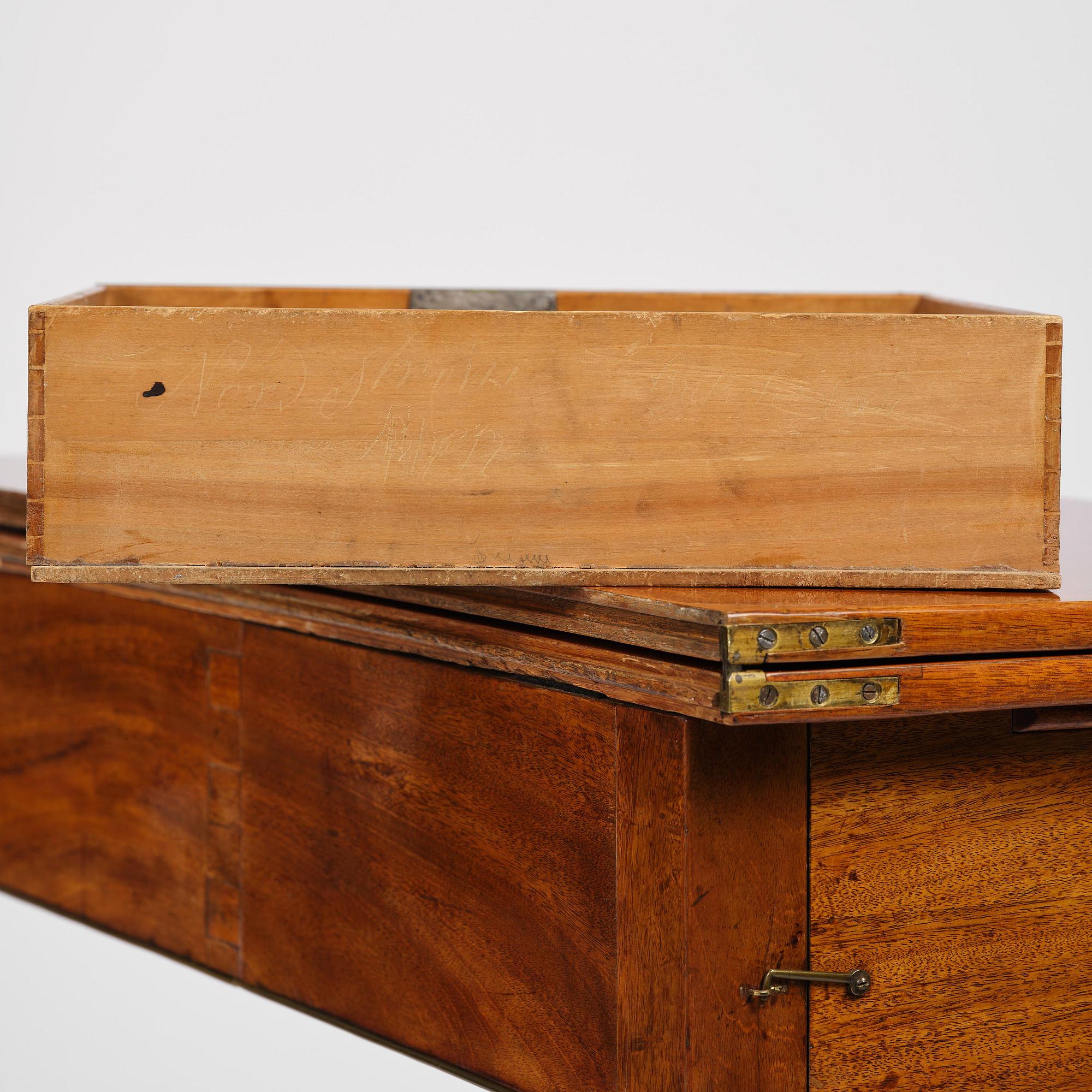 A late Gustavian mahogany games table, presumably by A. Nordström (Journeyman at G. Iwersson 1806-09).