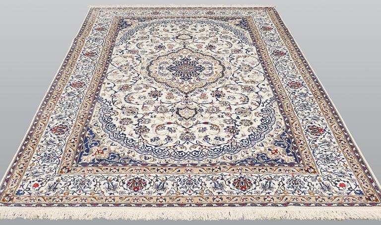 A carpet, Nain Part silk, 312 x 207 cm.
