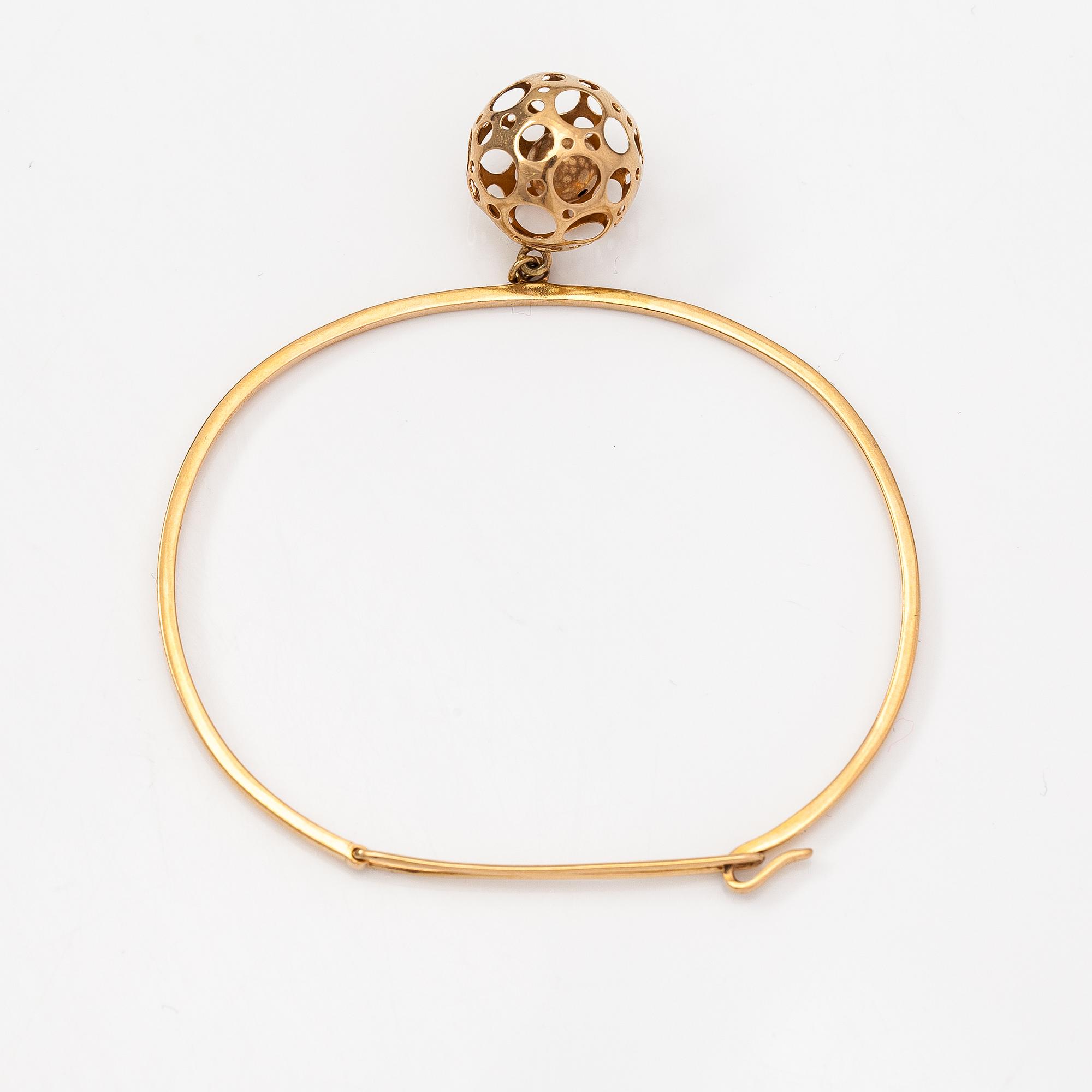 Liisa Vitali, A 14K gold bracelet "Leppäkerttu". Westerback, Helsinki 1969.