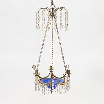 A late Gustavian three-light chandelier, Stockholm, late 18th century.