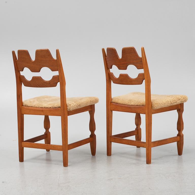 Henning Kjærnulf, a set of six oak 'Razorblade' chairs with new sheepskin upholstery, Nyrups, Denmark, 1960s.