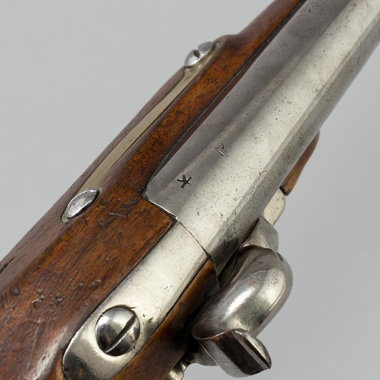 A first half of the 19th century percussion lock pistol.