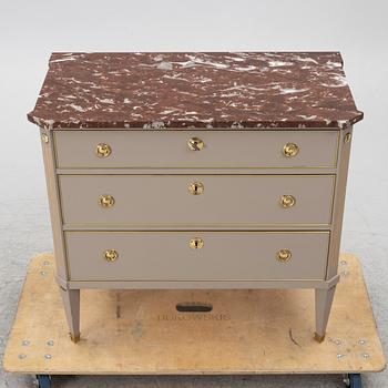 A Gustavian style chest of drawers, Mid 20th Century.