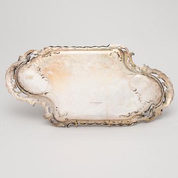 A German silver tray, mark of M.H. Wilkens & Söhne, Austrian import mark, retailer mark of V. Mayers Söhne, 1891-1901.