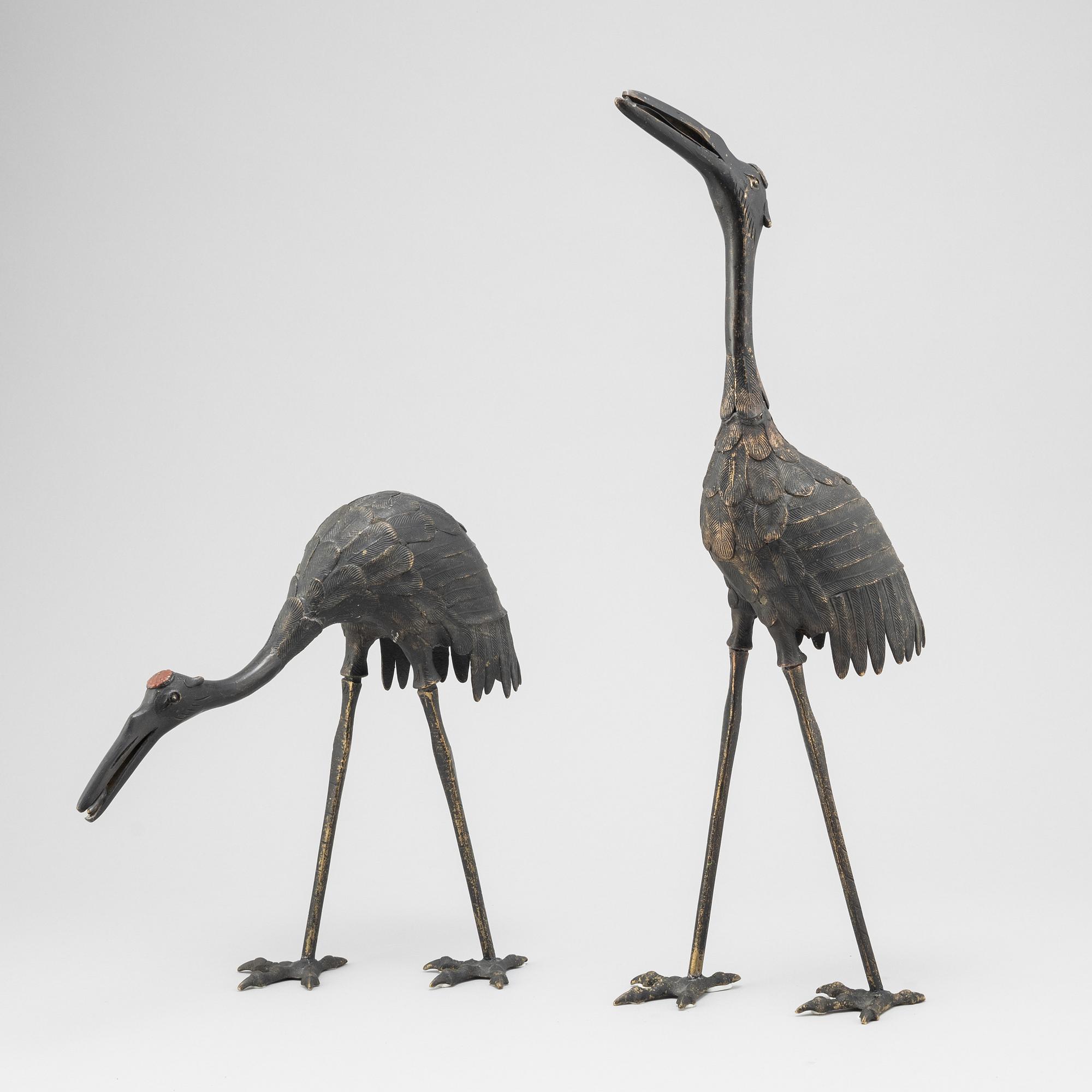 A pair of Chinese metal cranes, first half of the 20th century.