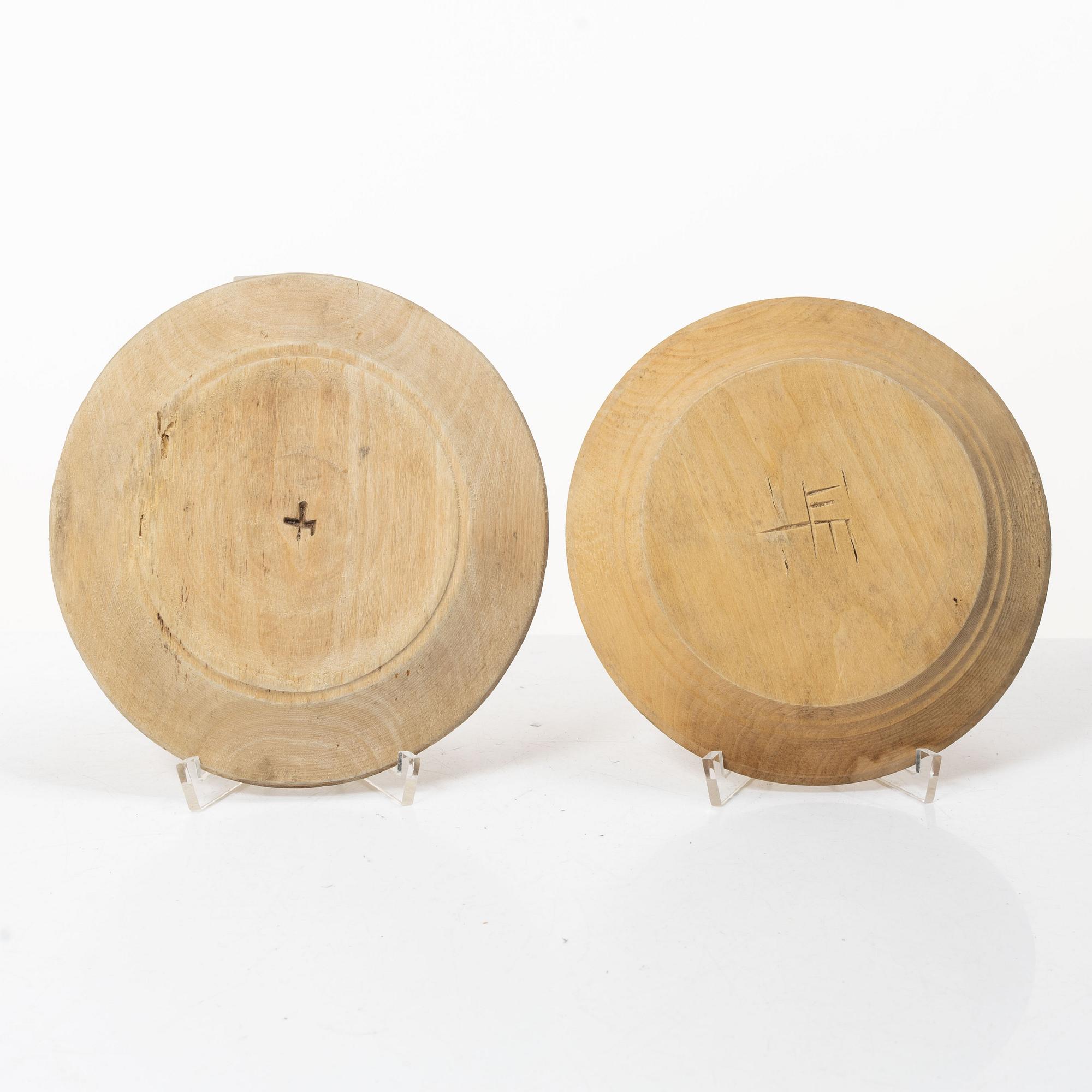 Ten wooden plates, 19th Century.