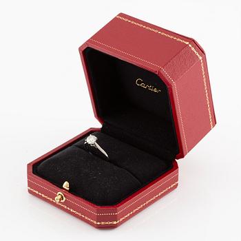 A Cartier ring in platinum with a round brilliant-cut diamond 0.91 ct according to the engraving.
