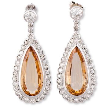 112. A PAIR OF EARRINGS, facetted topazes, old- and 8/8 cut diamonds, platinum.