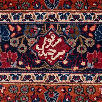 A semi-antique Birjand carpet, Eastern Iran, signed, c 390 x 296 cm.