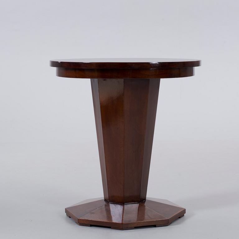 AN ART DECO STYLE TABLE, from the middle of the 20th century.