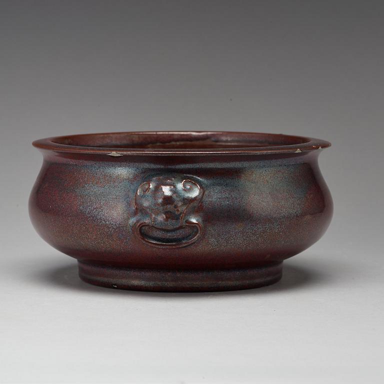 A red glazed censer, Qing dynasty, 19th Century.