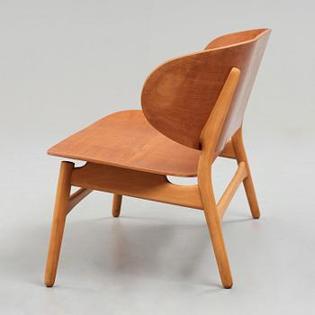 A HANS J WEGNER, a  "Shell set/ Skalsæt" comprising a sofa, a chair and a table, Fritz Hansen, Denmark 1950's.