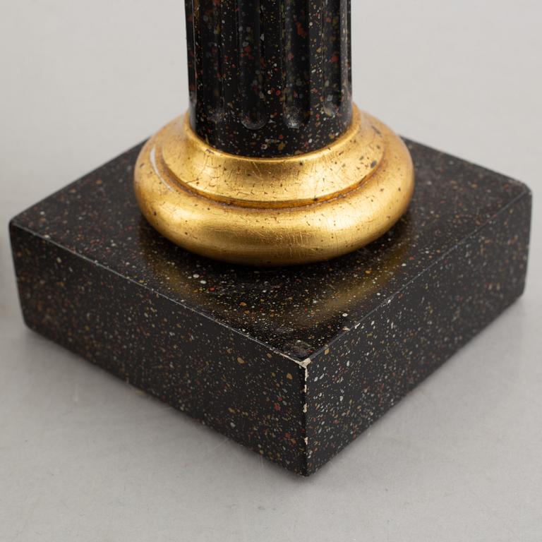 A pair of porphyry imitation candlesticks, 20th century.