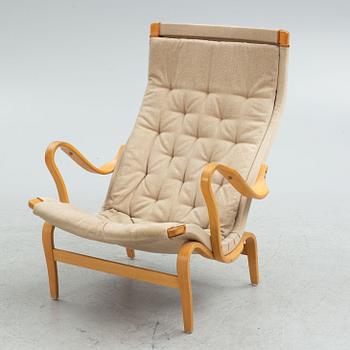 Bruno Mathsson armchair, "Pernilla" with footstool, Dux, late 20th century.