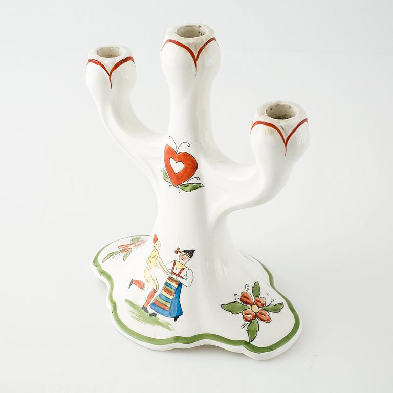 A candelabrum in ceramic named "Daldansen", Rörstrand, from early 20th century.