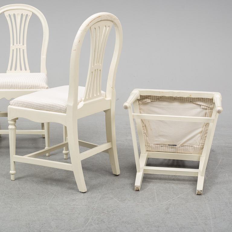 Four early 20th Century painted Gustavian style chairs.