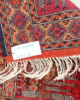 A silk Beluch rug, c. 124 x 81 cm.